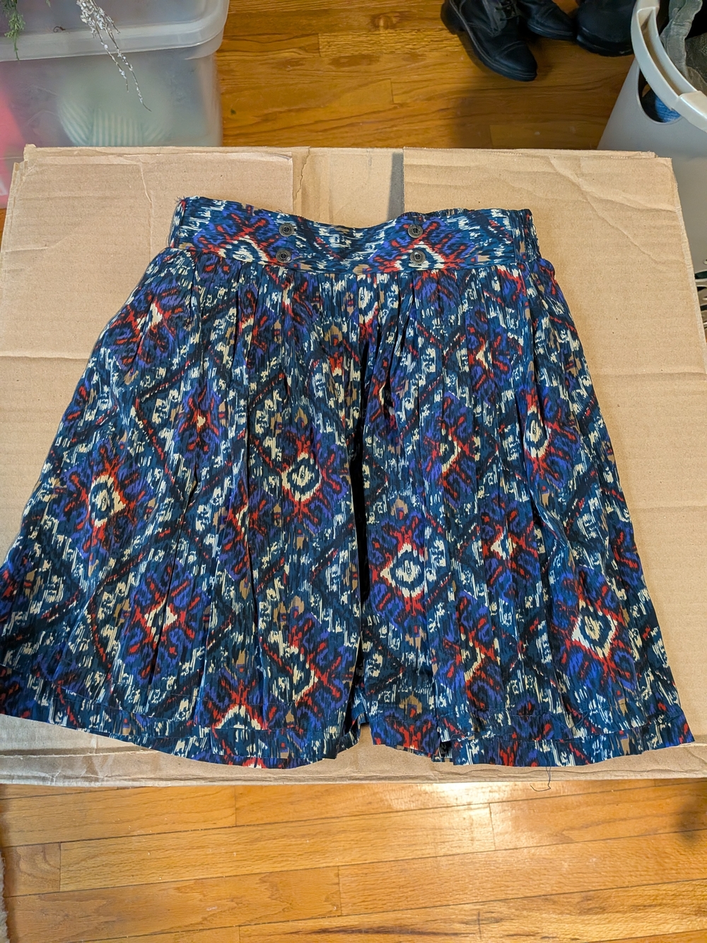 Sparkle & Fade Navy Ikat-Style Pleated Skirt with Red and Cream Accents